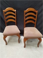 Two nice chairs one of them looks like it needs a