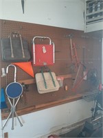 Wall contents stadium chairs hand saw chainsaw