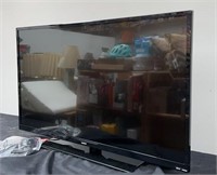 Samuel TV with HDMI cord, power cord and remote