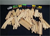 Small wooden train with wooden tracks