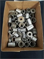 Box of various sizes and brands of sockets