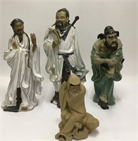 Group Of 4 Tall Oriental Mud Figures
