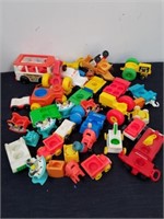 Group of vintage Fisher Price toys