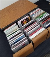 Group of miscellaneous CDs inside CD case