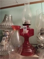 Red oil lamp with extra shade, 18"
