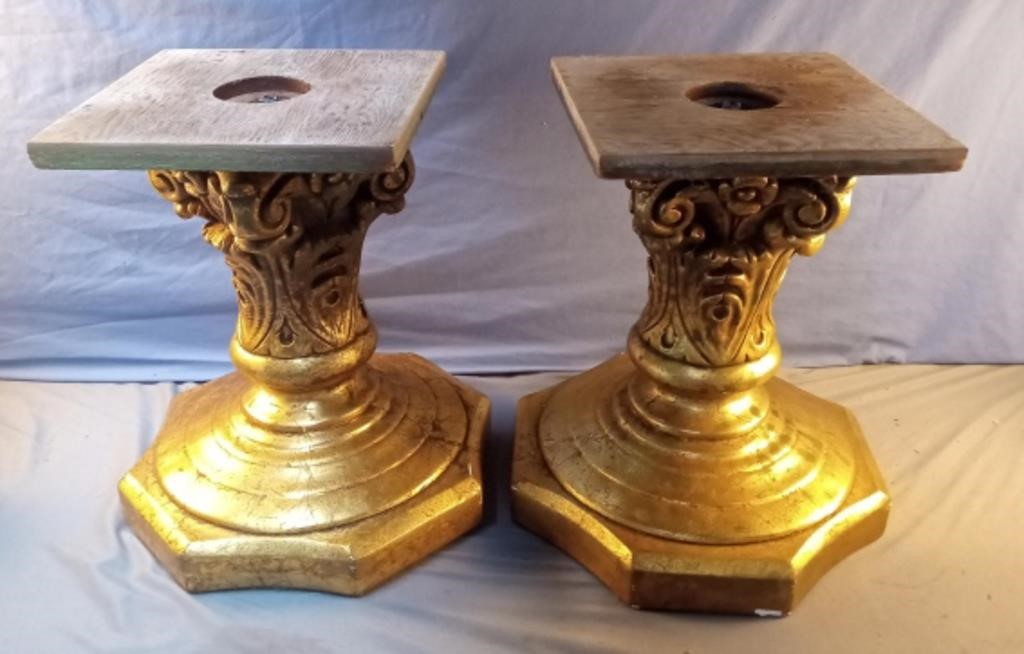 2 heavy plant stands. Gold in color