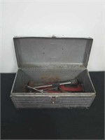 Vintage metal toolbox with tools