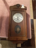 Wooden wall clock with key
