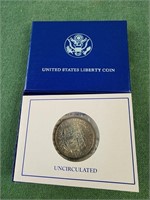 US Liberty 1986 half dollar coin in box