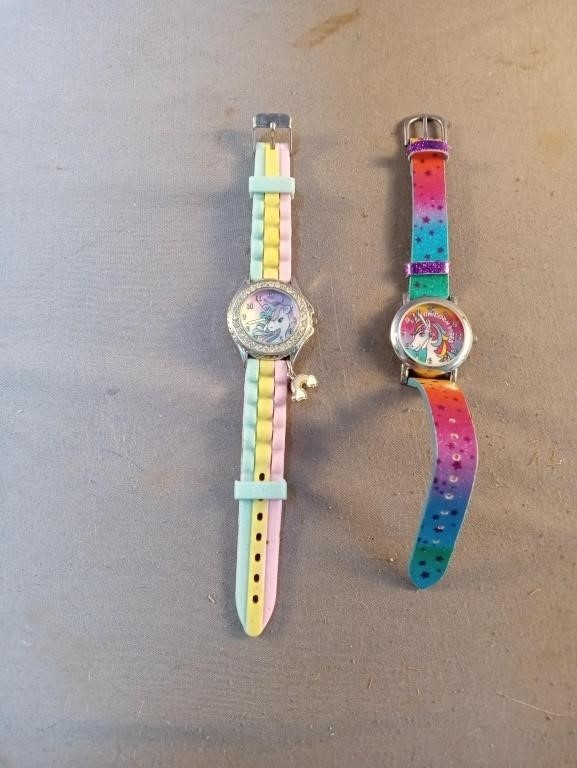 2 Accutime unicorn watches