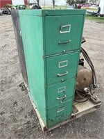 Green metal filing cabinet