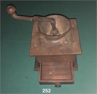 Wood-cased spice or coffee mill with drawer