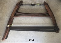 Pair wooden framed buck saws