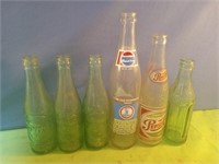 Vintage glass bottles including Cheerwine, Dr