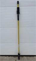 yellow extension pole