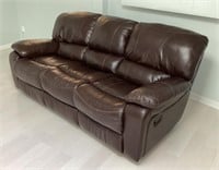 Dual reclining brown leather sofa