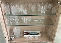Contents of kitchen cabinet with glassware