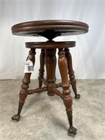 Wood claw foot swivel stool
