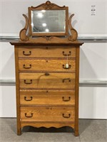Oak five drawer chest with beveled mirror