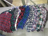 12 used flannel shirts, mostly medium