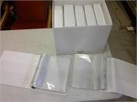 12 large white binders/sleeves