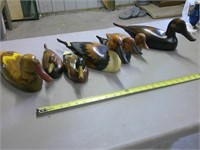 carved and painted ducks