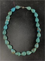 Turquoise necklace with large tear drop shaped bea