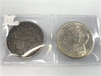 Two Morgan silver dollars 1890 O and 1921