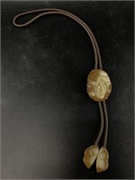 Ivory carved bolo tie in style of Cha, very detail