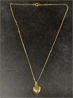 14kt Gold heart pendant on gold chain, chain is 14