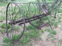 Antique Rake, wheels bent, Great Yard Art