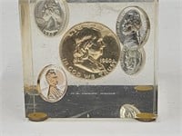 Paperweight with uncirculated coins