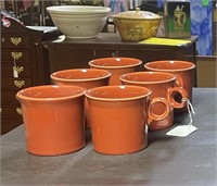Set of six orange fiestaware mugs