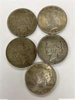 1923-34 Peace Silver Dollars.