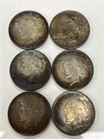 1922-34 Peace Silver Dollars.