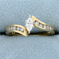 1/2ct TW Marquise and Round Diamond Bypass Engagem