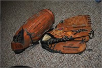 2 softball gloves