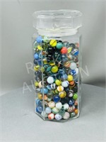 10" tall glass jar w/ vintage marbles