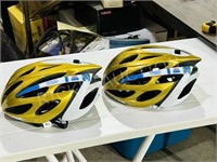 pair of new Lazer bike helmets