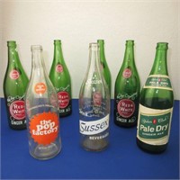 7 Large Vintage Pop Bottles 30 fl oz.