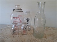 5 vintage milk bottles