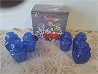 Lighted ceramic truck, blue bottles