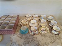 12 china cups and saucers with case