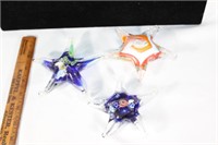 Three hand blown glass star fish paper weights