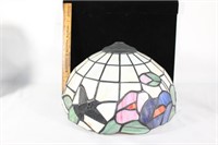 Stained glass lamp shade with humming bird detail