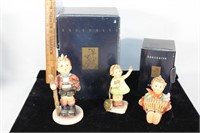 Two M.J. Hummel Exclusive edition figurines