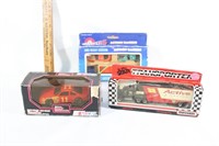 Three toy cars-NASCAR,Matchbox, etc