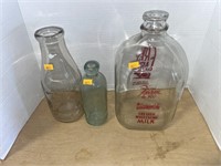 Vintage milk bottles and medicine bottle
