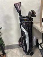 Top Flite golf clubs and bag