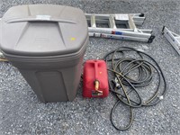 Rubbermaid trash can, gas can, water hose